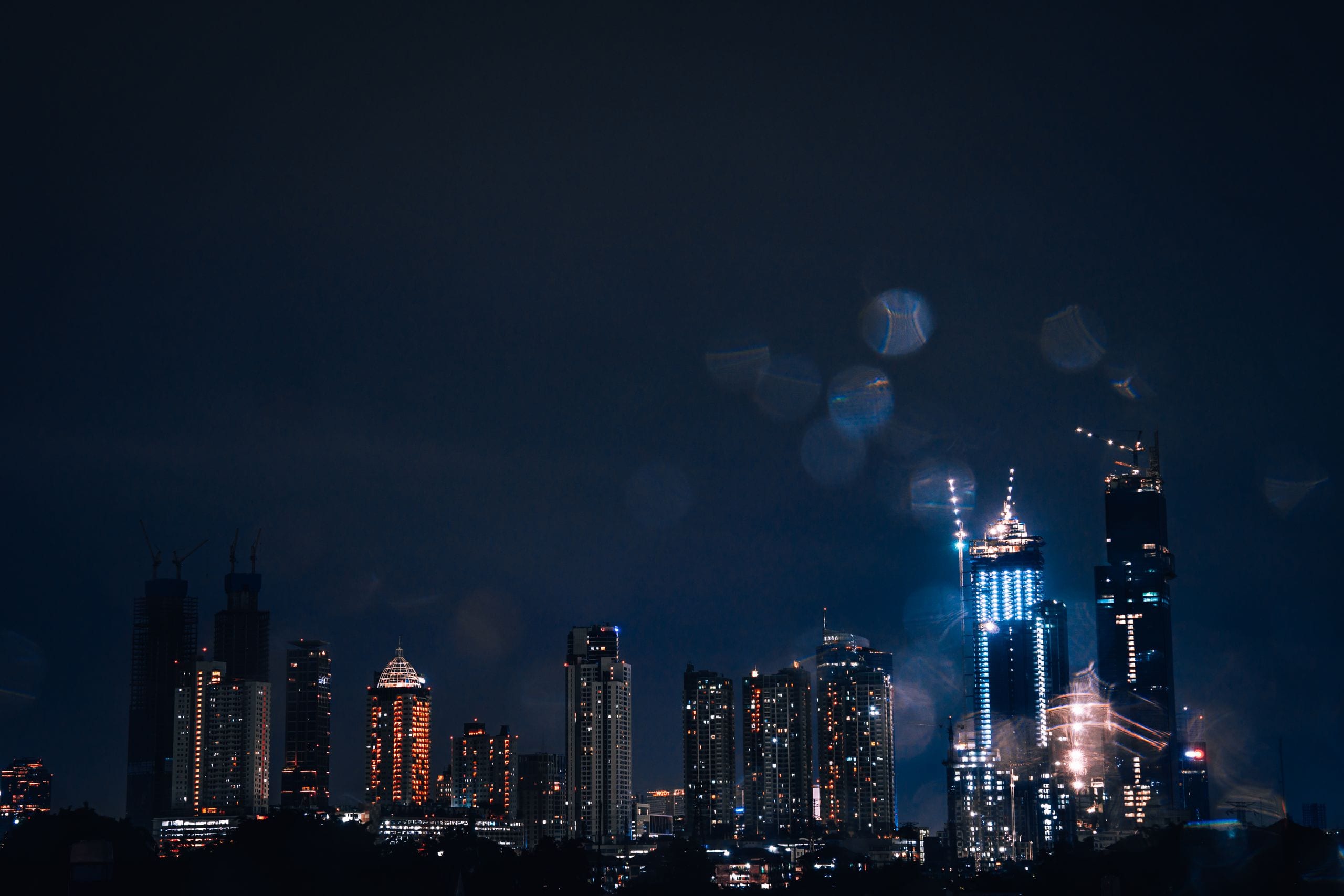 Stunning nighttime view of the Jakarta skyline featuring illuminated s