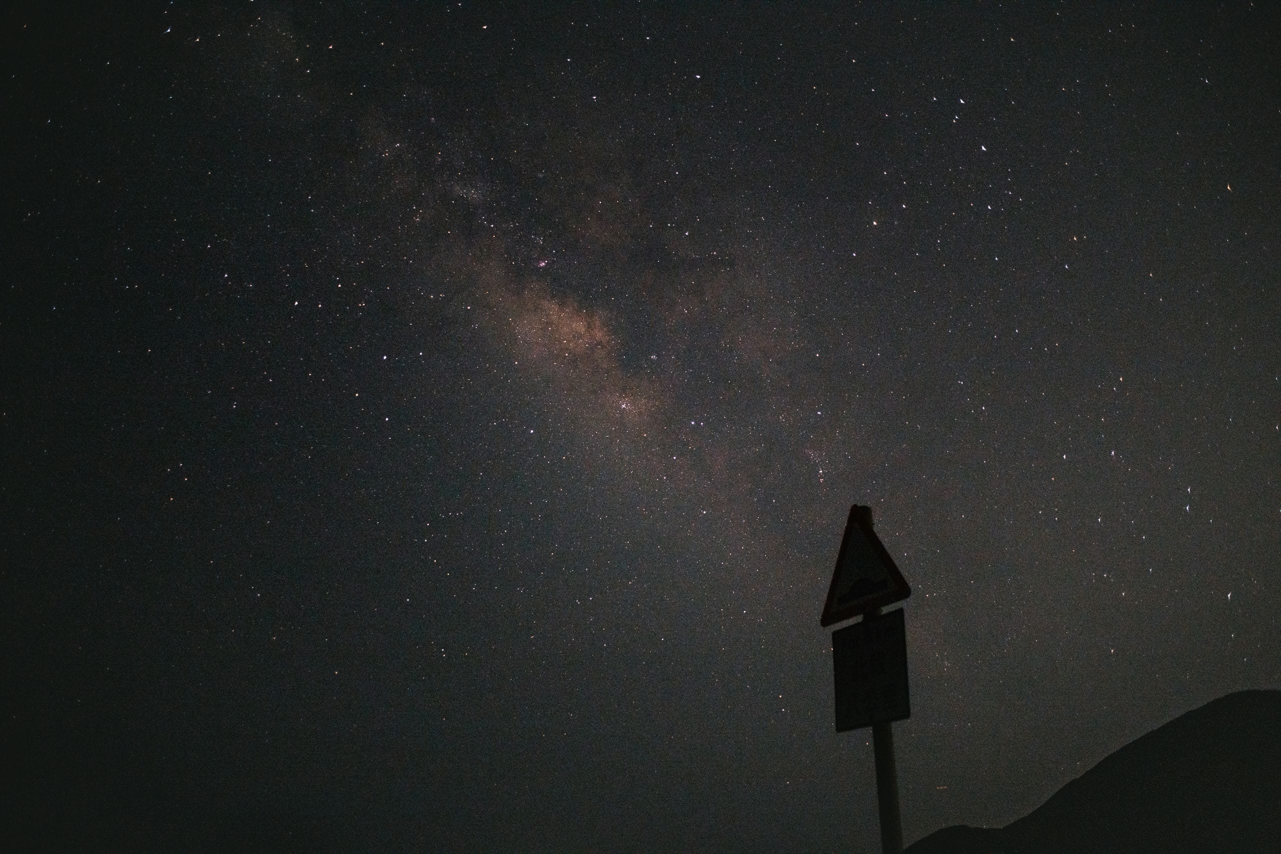A mesmerizing view of the Milky Way galaxy under a dark, starry night
