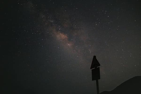 A mesmerizing view of the Milky Way galaxy under a dark, starry night 