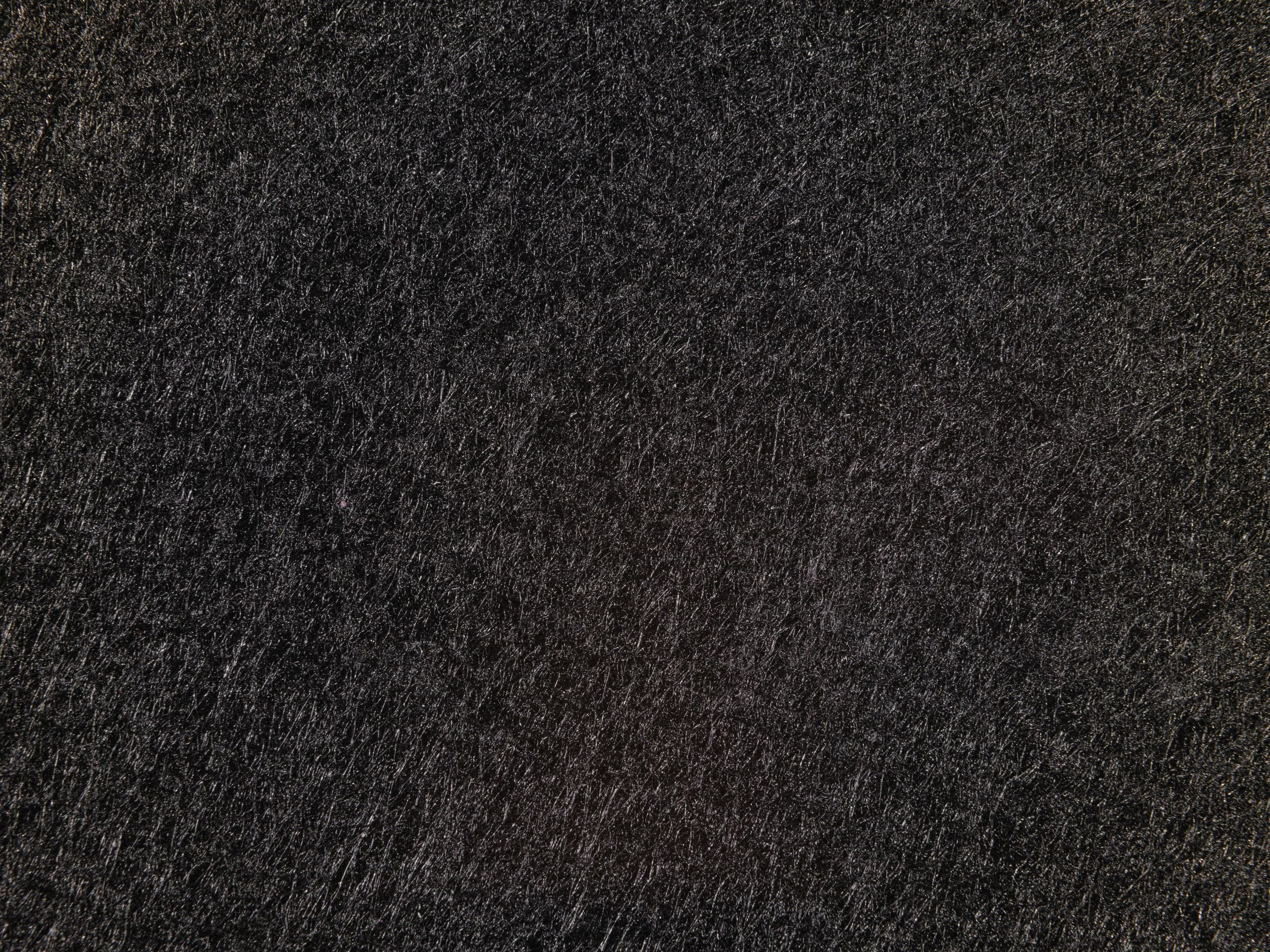 Close-up of a black textured surface, perfect for abstract backgrounds