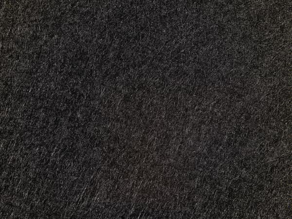 Close-up of a black textured surface, perfect for abstract backgrounds