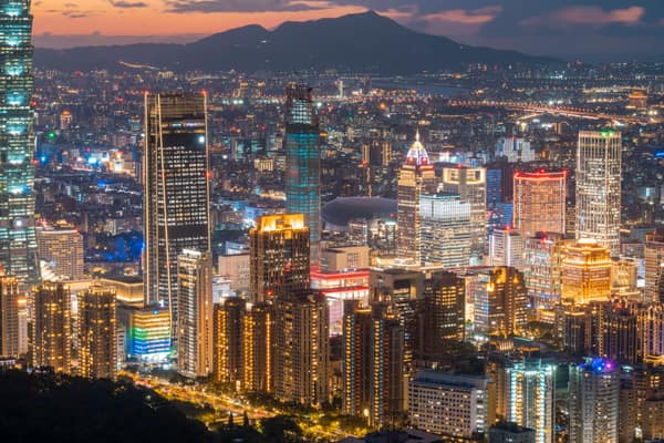 A stunning nighttime view of Taipei city, showcasing its illuminated s