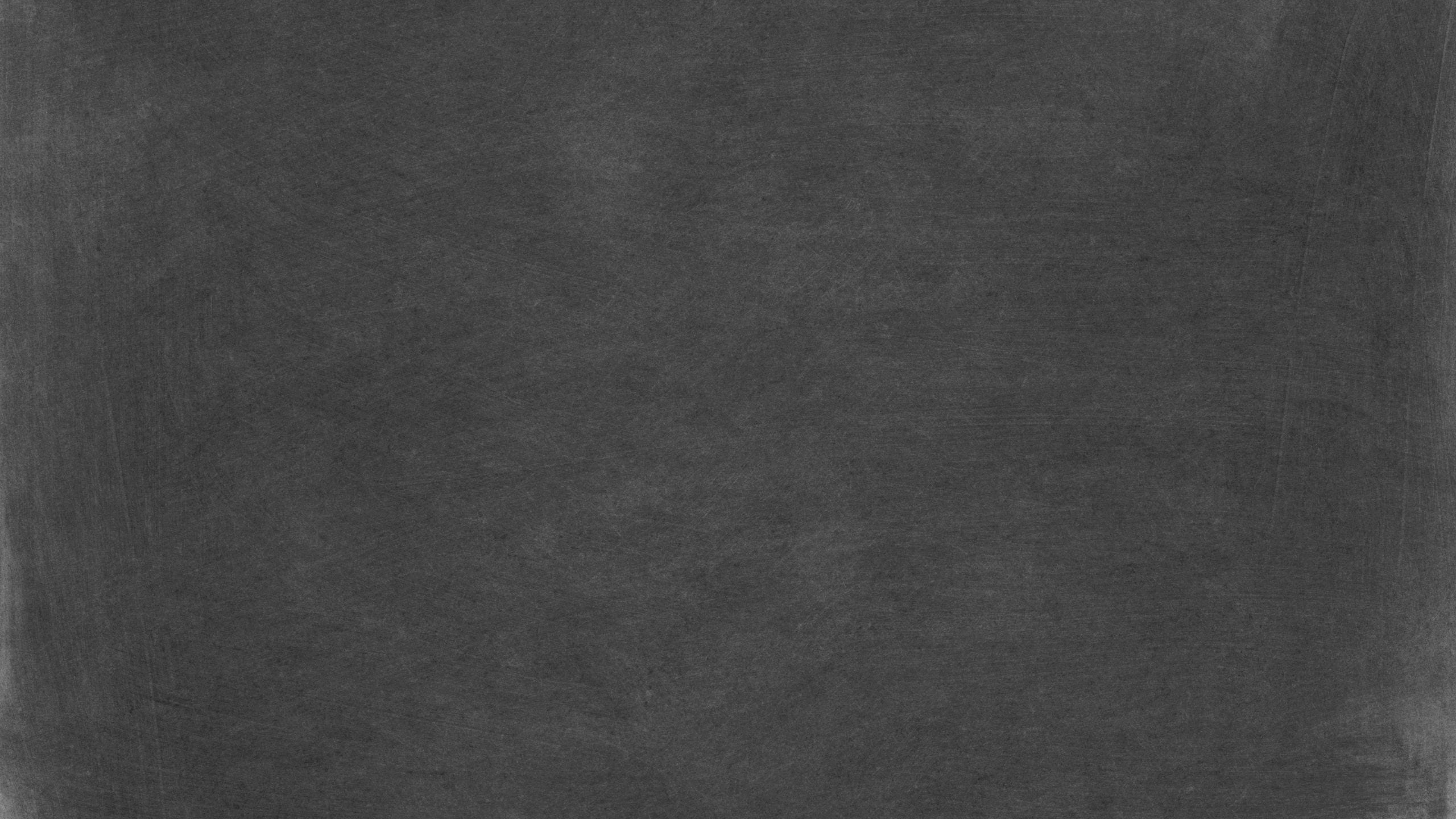High-resolution dark chalkboard texture perfect for educational and de