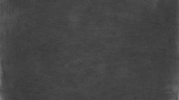 High-resolution dark chalkboard texture perfect for educational and de