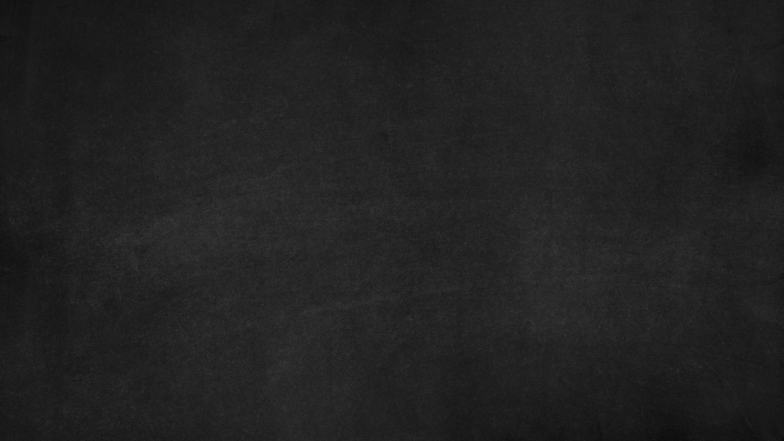 A high-resolution blank chalkboard texture, perfect for education-rela