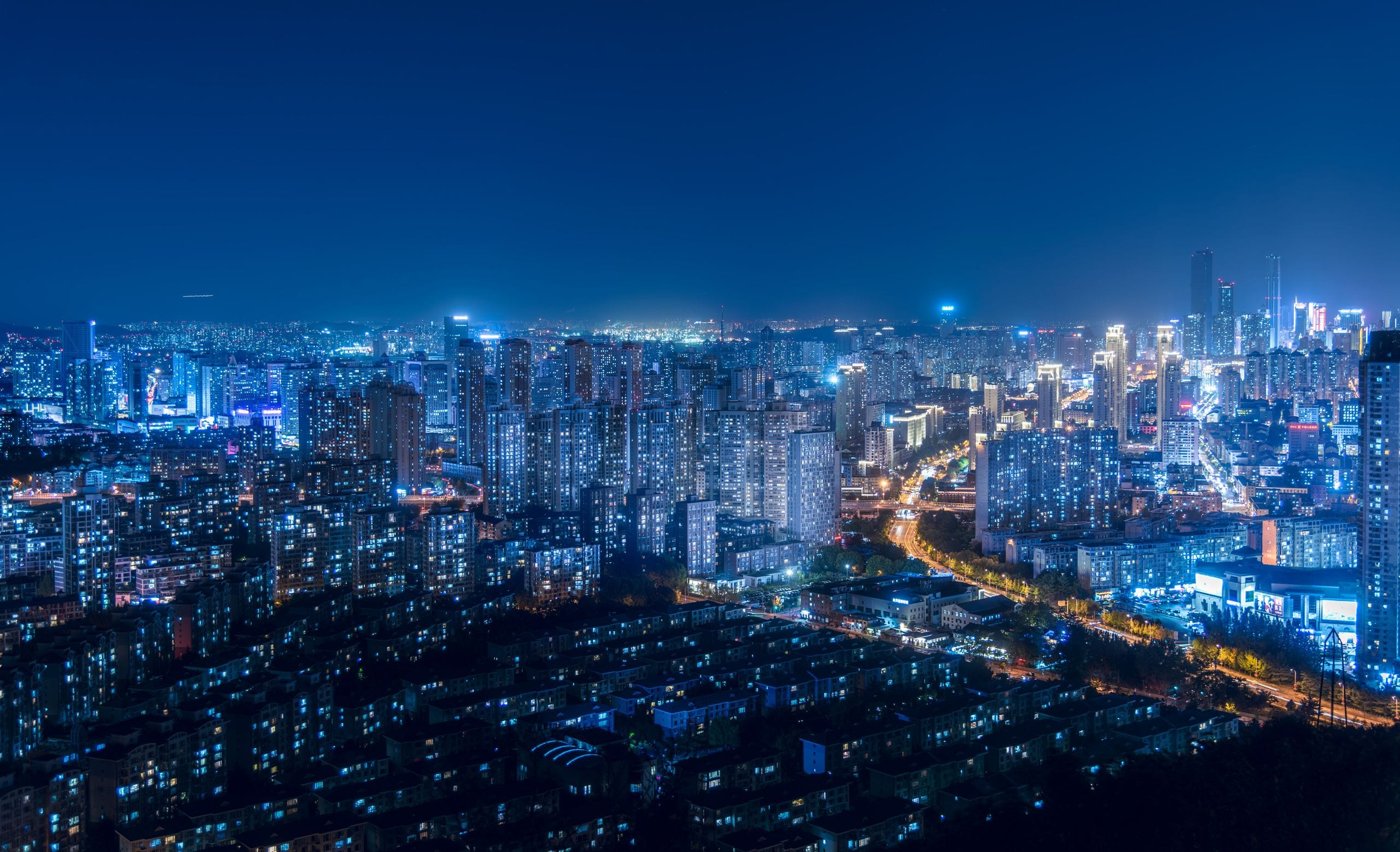 A breathtaking cityscape with illuminated skyscrapers and vibrant urba
