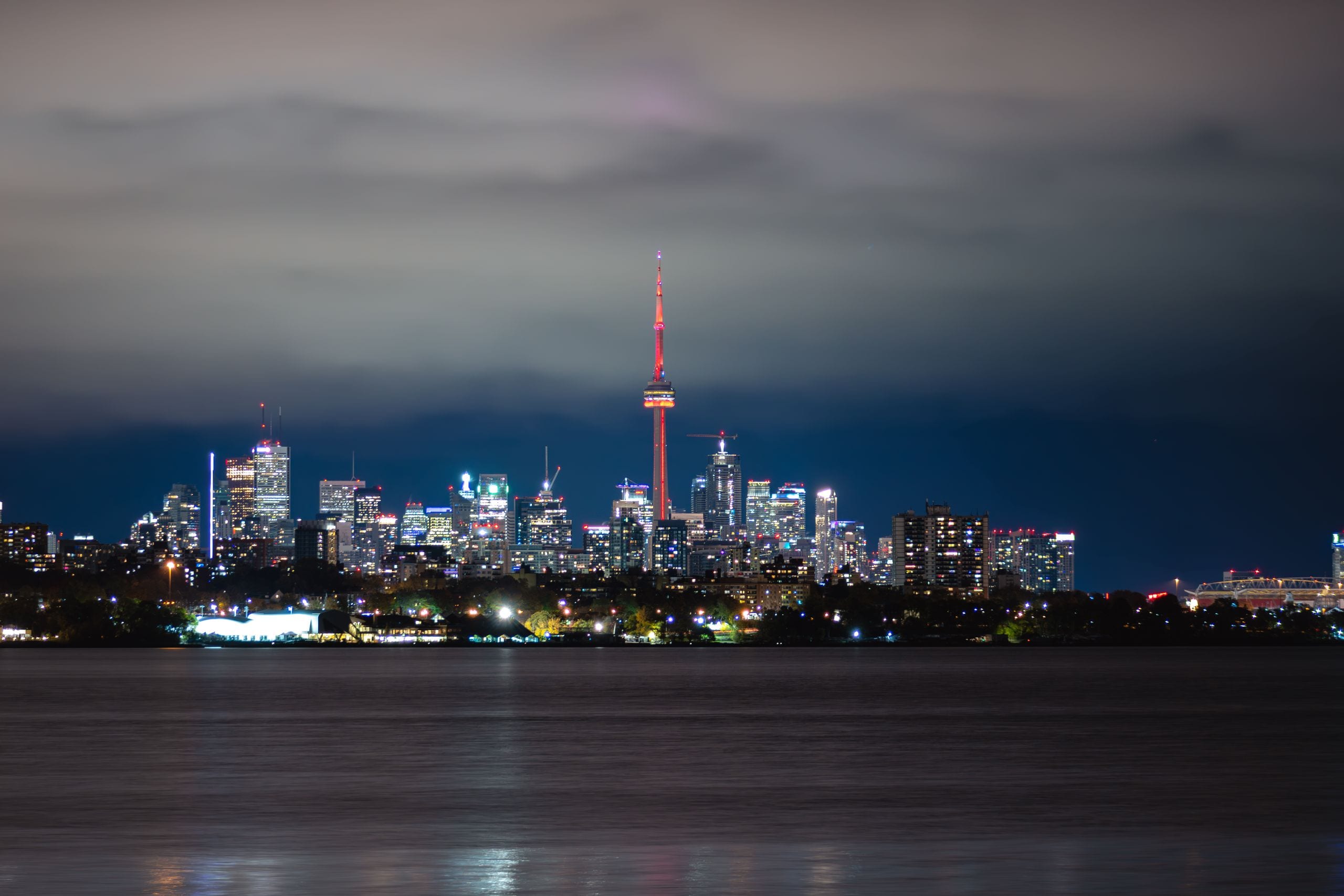 Breathtaking night view of Toronto cityscape with the iconic CN Tower