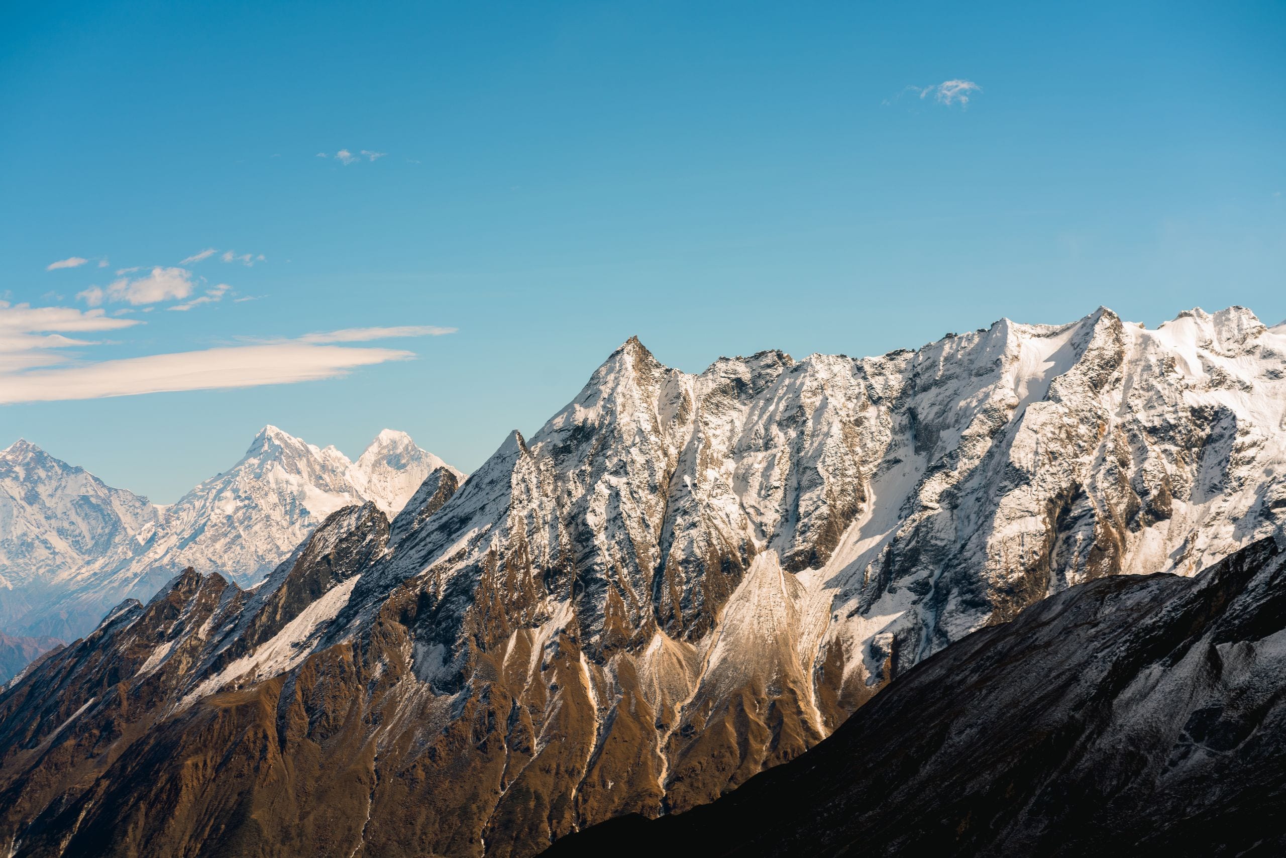 Stunning view of snow-capped Himalayan peaks against a clear blue sky