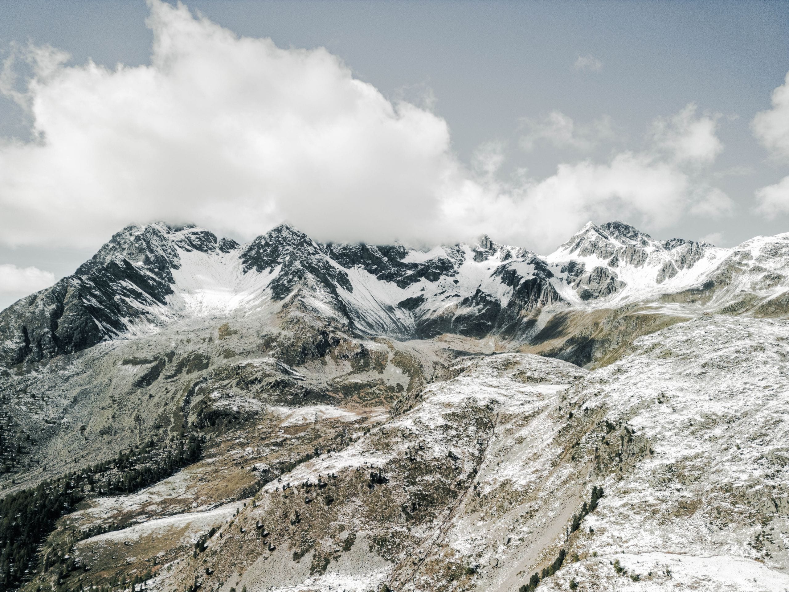 A stunning view of snow-covered mountains in Poschiavo, Switzerland, s