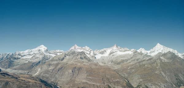 Stunning aerial view of the snow-capped Swiss Alps in Zermatt, capturi