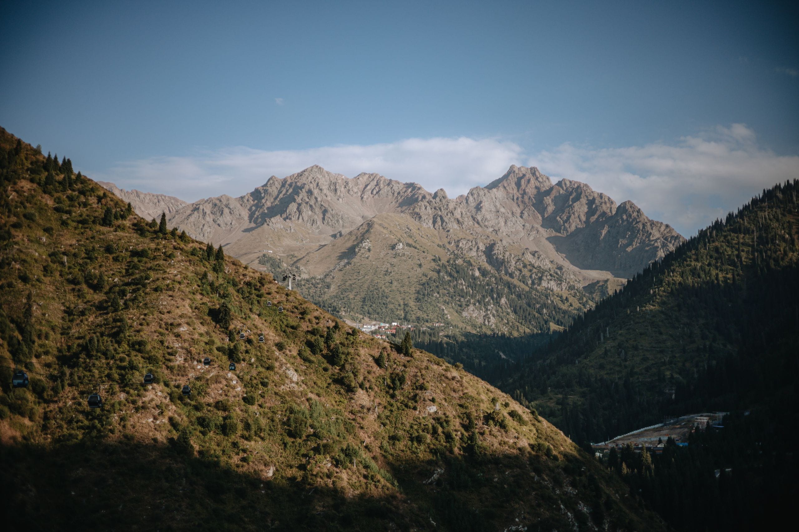 Majestic mountain landscape with clear sky and rugged peaks, perfect f