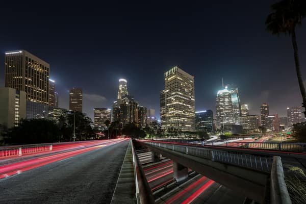 Vibrant long exposure of Downtown Los Angeles skyscrapers at night, sh