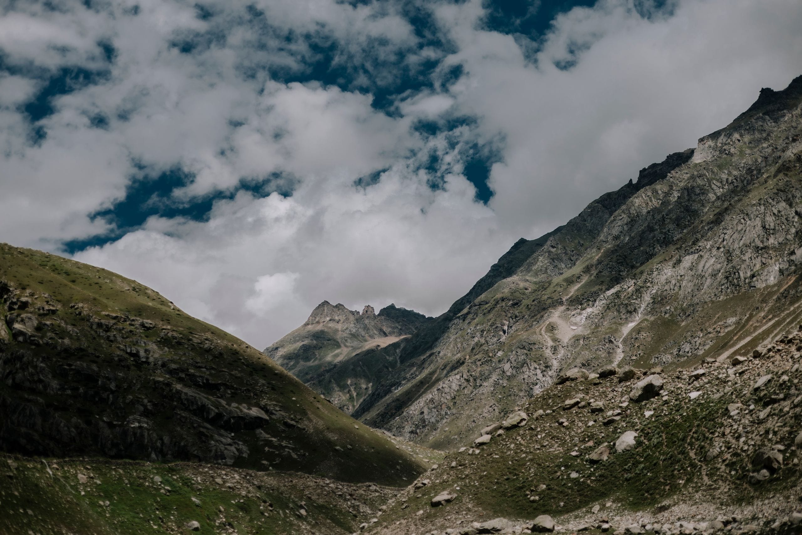Breathtaking view of rugged mountains under a cloudy sky in Spiti Vall