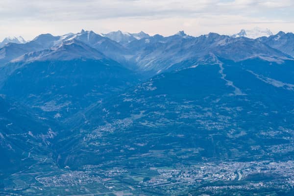 Stunning aerial view of the Swiss Alps showcasing majestic mountain ra