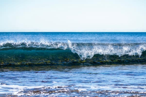 Stunning ocean wave captured at Culburra Beach, New South Wales, showc