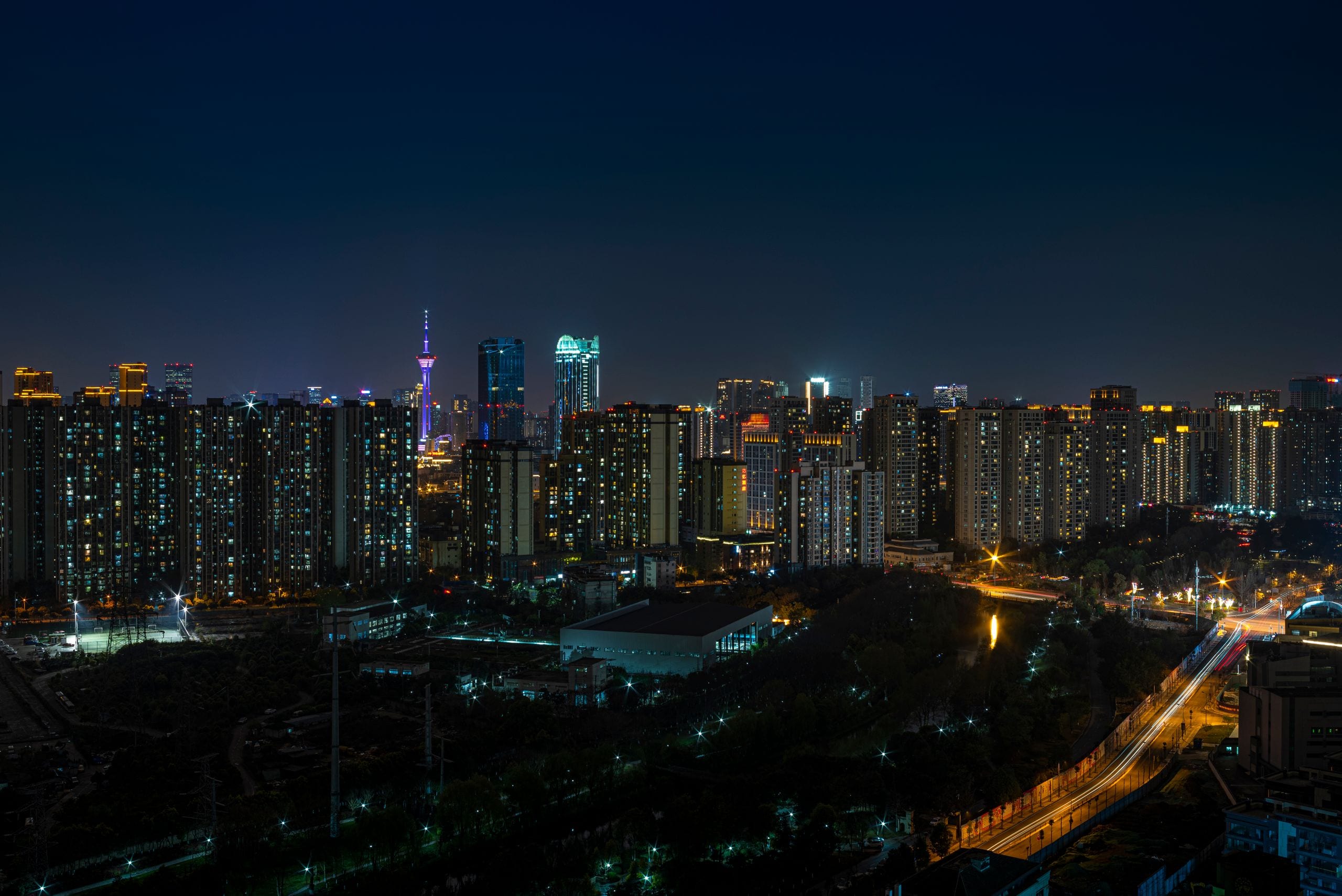 Explore the vibrant Chengdu skyline at night showcasing urban architec