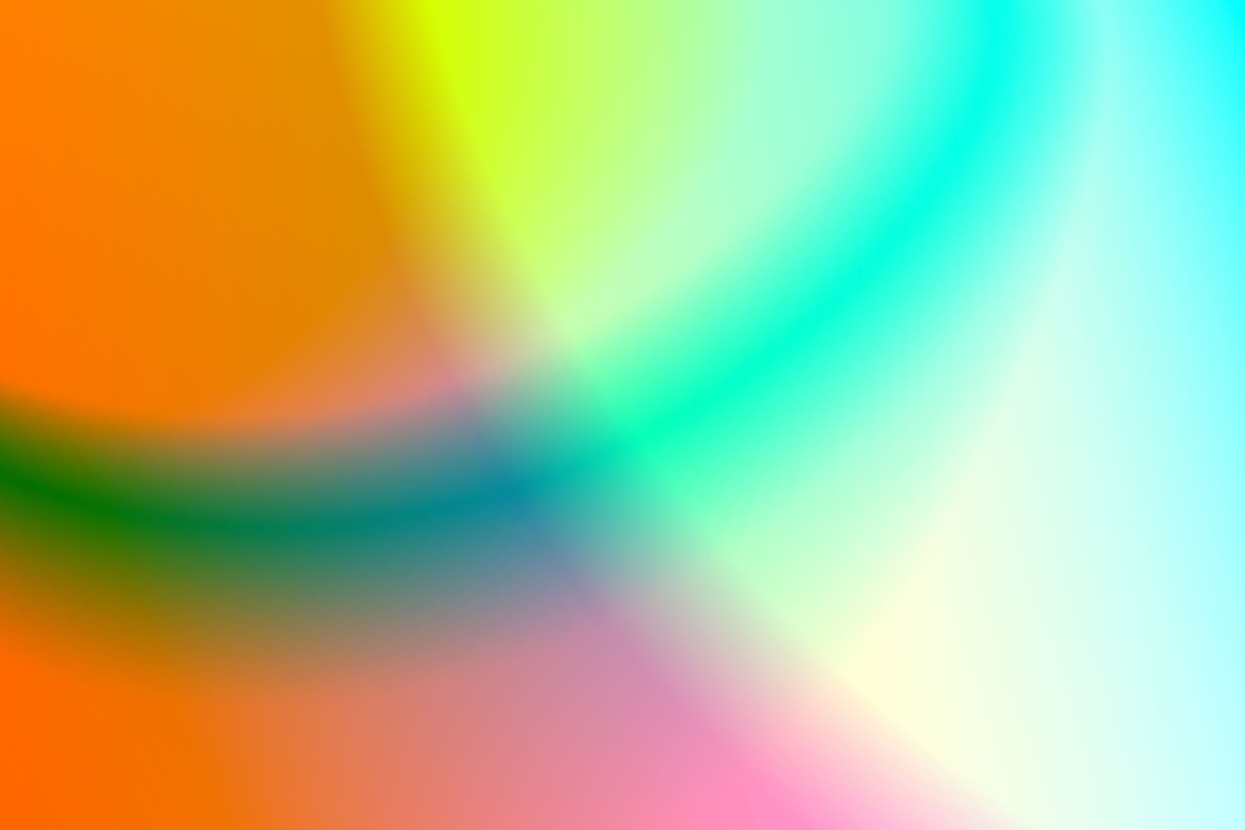 A vivid and colorful abstract gradient background with smooth transiti