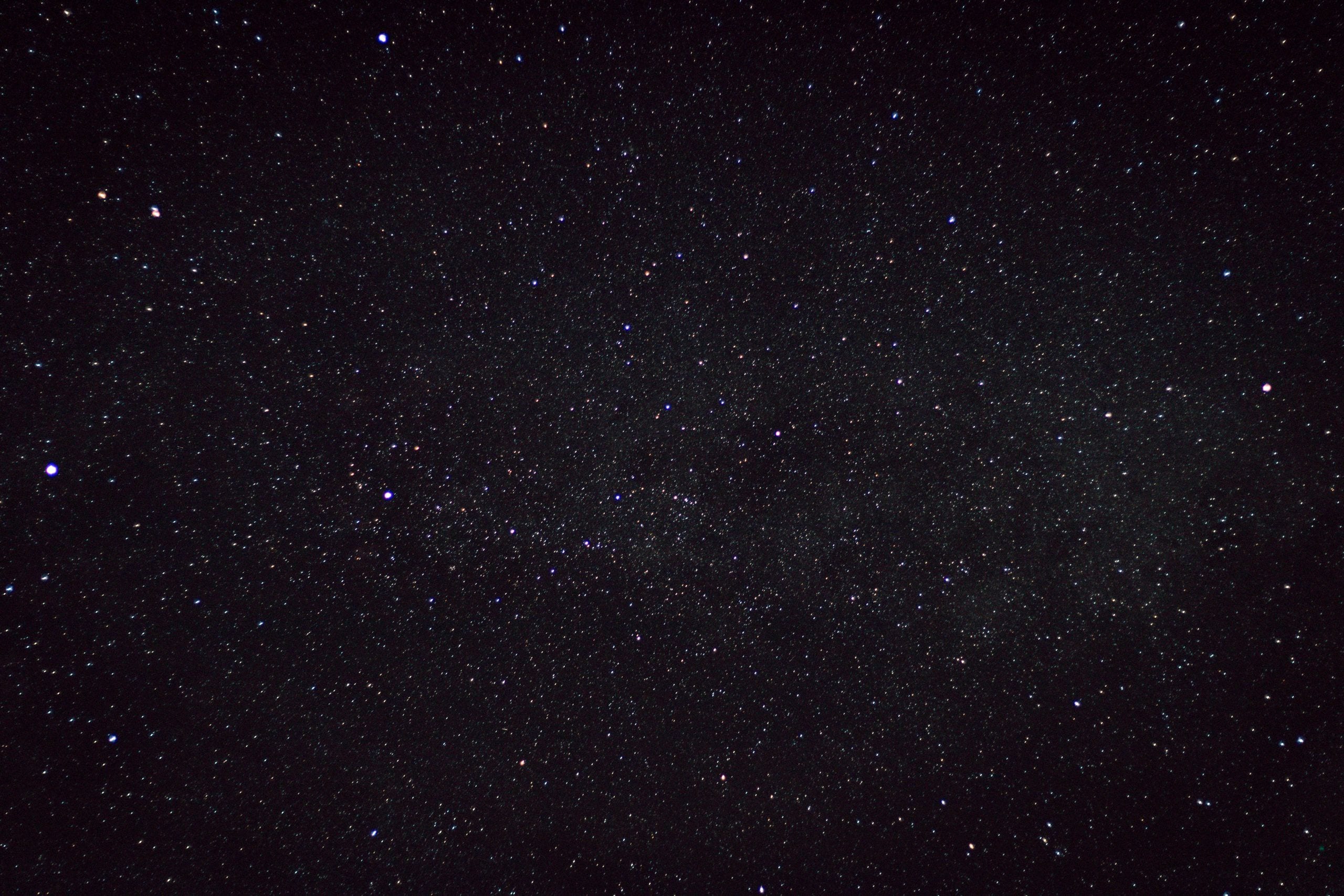 A clear starry night sky captured over the countryside in Germany, sho