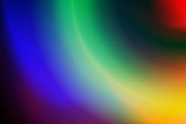 An artistic abstract background with a spectrum of vibrant colors form