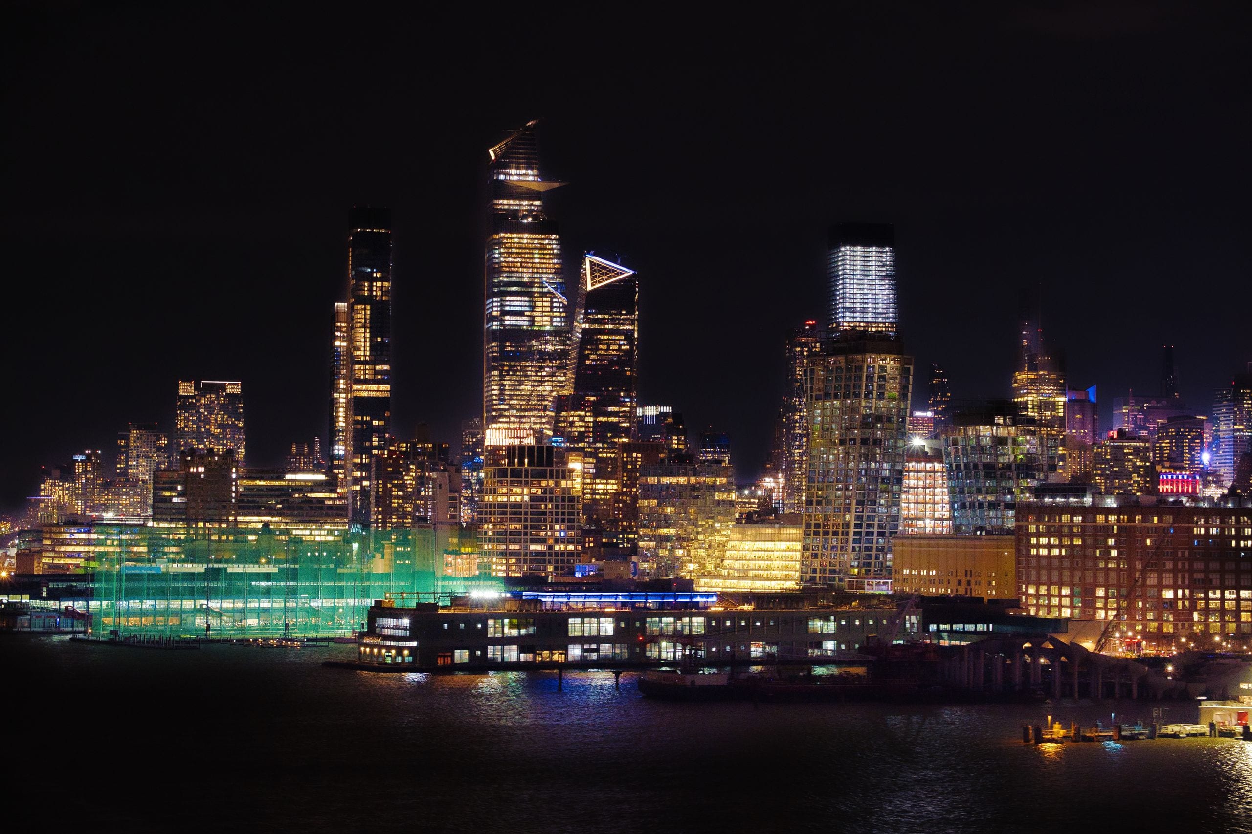 Captivating night cityscape of New York City with illuminated skyscrap